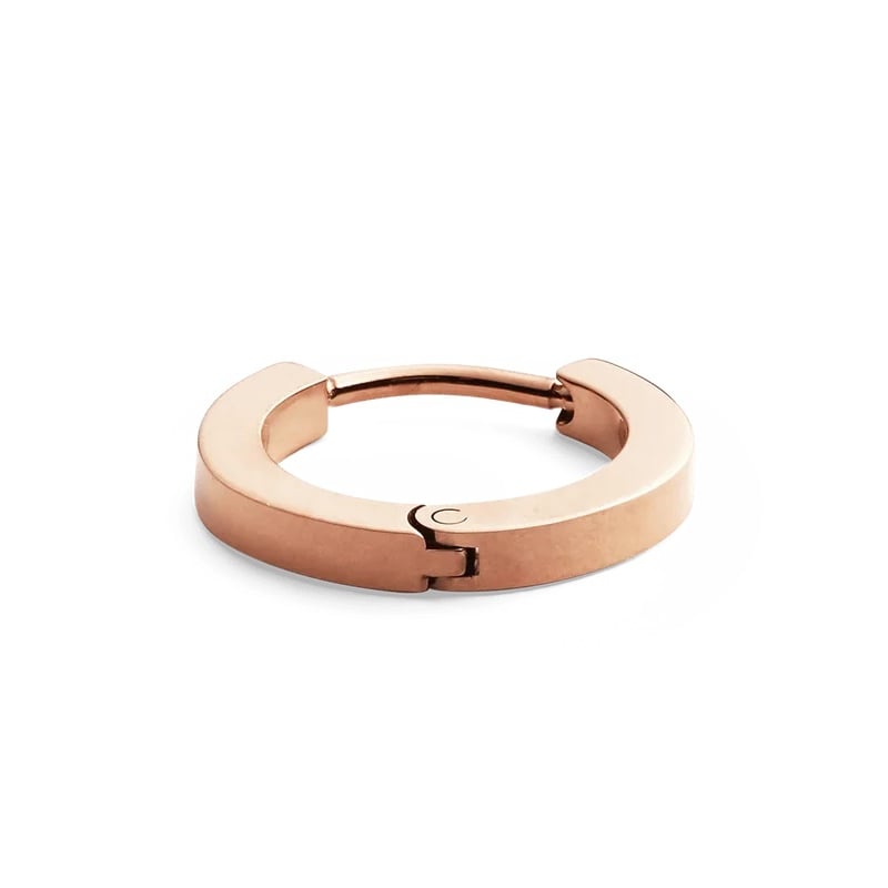Minimalistická single náušnice z pozlacené oceli DW00400862 Daniel Wellington